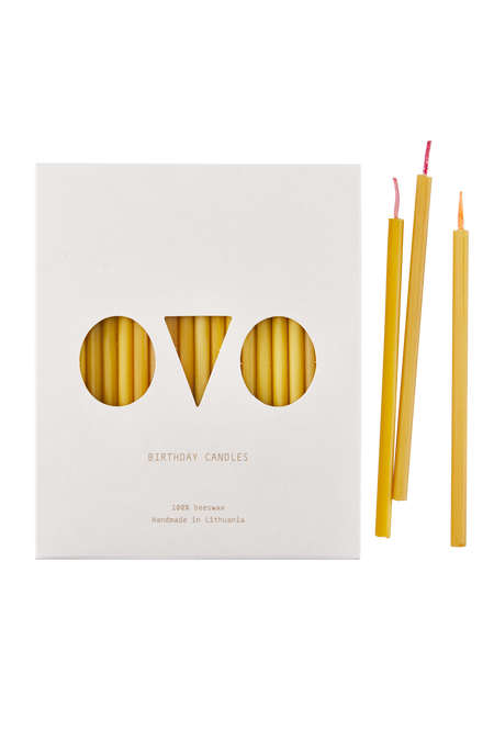 Birthday candles from pure beeswax with multicolored cotton wicks.