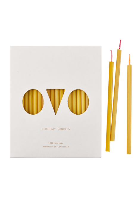 Birthday candles from pure beeswax with multicolored cotton wicks.