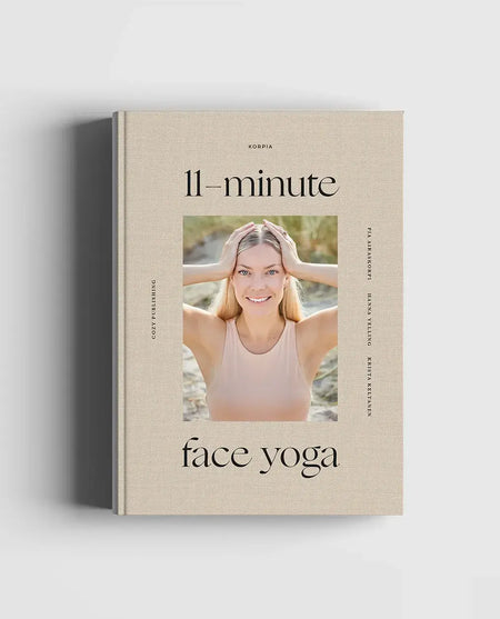 Book titled '11-Minute Face Yoga' with a photo of a woman on the cover against a light gray background