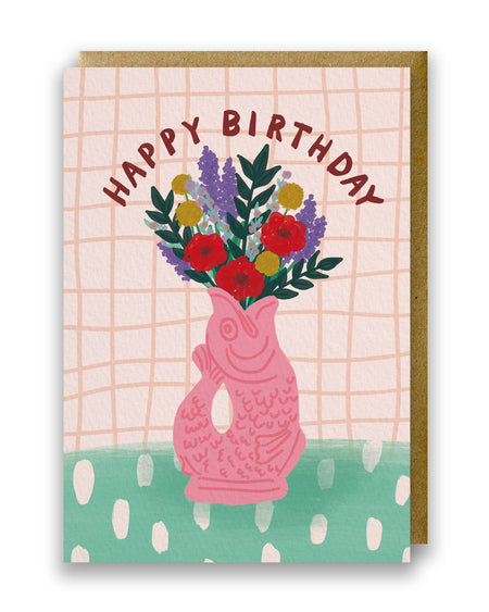 Birthday card with pink vase and flowers on a grid background
