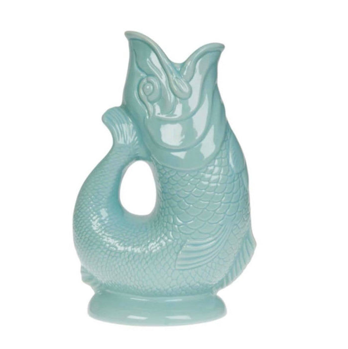 Turquoise ceramic fish-shaped vase on a white background