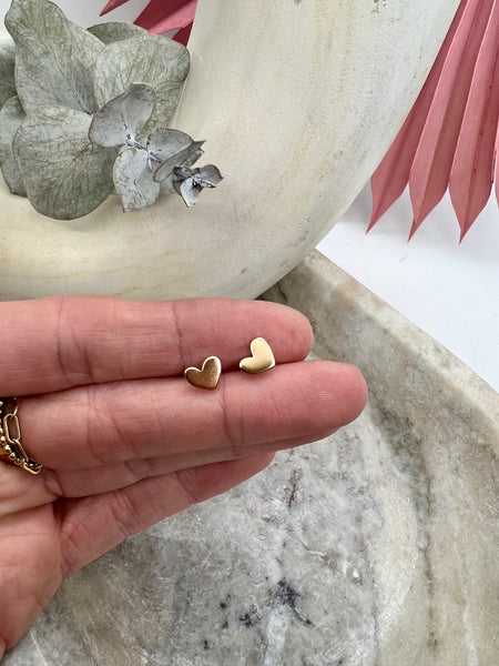 14k gold-filled mini heart stud earrings.