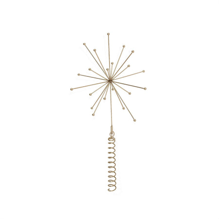 Decorative gold starburst ornament on a white background