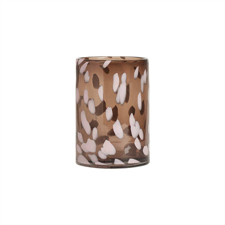 Decorative glass vase with a brown and white pattern on a white background